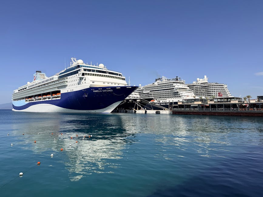 Majestic cruise ships docked at Kusadasi port, Aegean coast, under a clear blue sky.