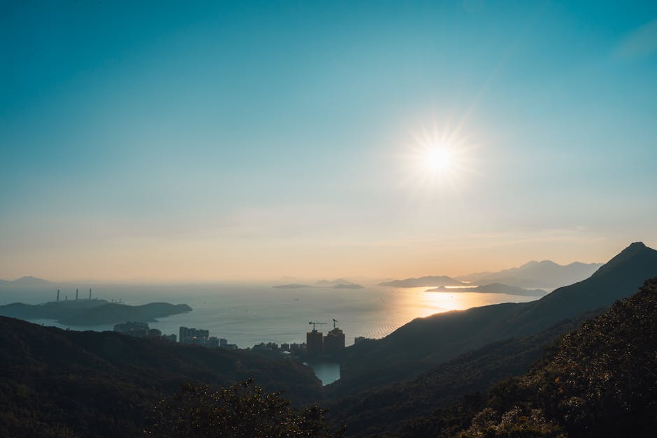 Stunning sunset landscape over Hong Kong Island with coastal views.